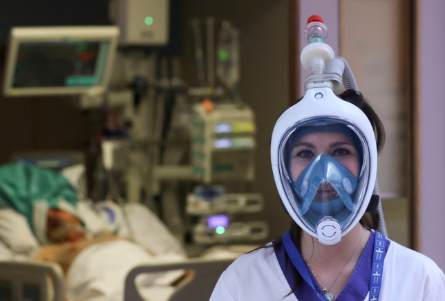 health worker wearing a face mask made from an upcycled scuba mask