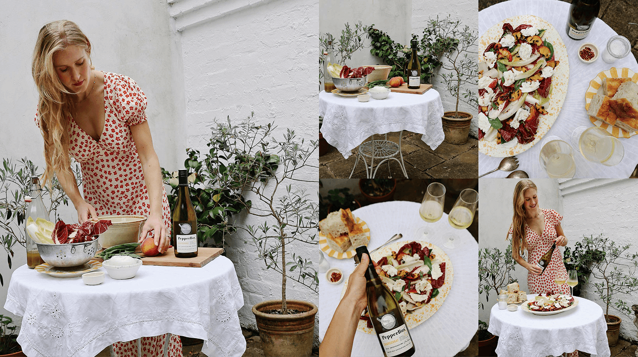 Woman in dress preparing food featuring the PepperBox white wine bottle